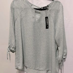 Mint green and whit polkadot shirt